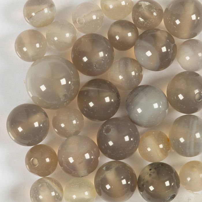 Perline di agata, diam 6+8+10 mm, misura buco 0,9-1 mm, grigio transparent, 28 pz/ 1 conf.