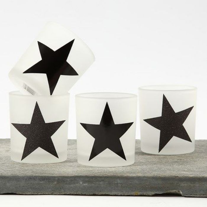 Portacandele con stelle di carta decorata