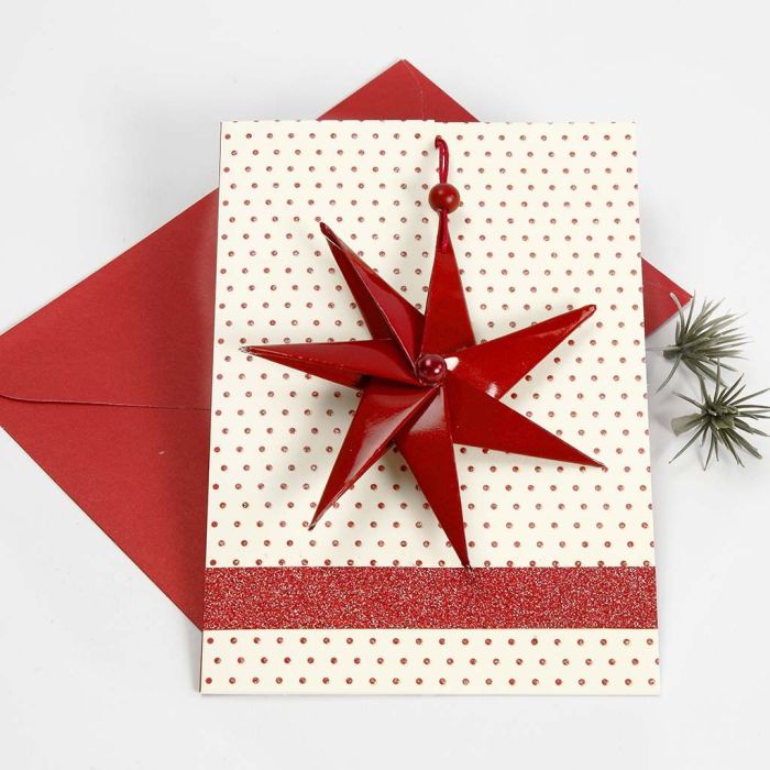 Cartolina di Natale con stella a sette punte e nastro