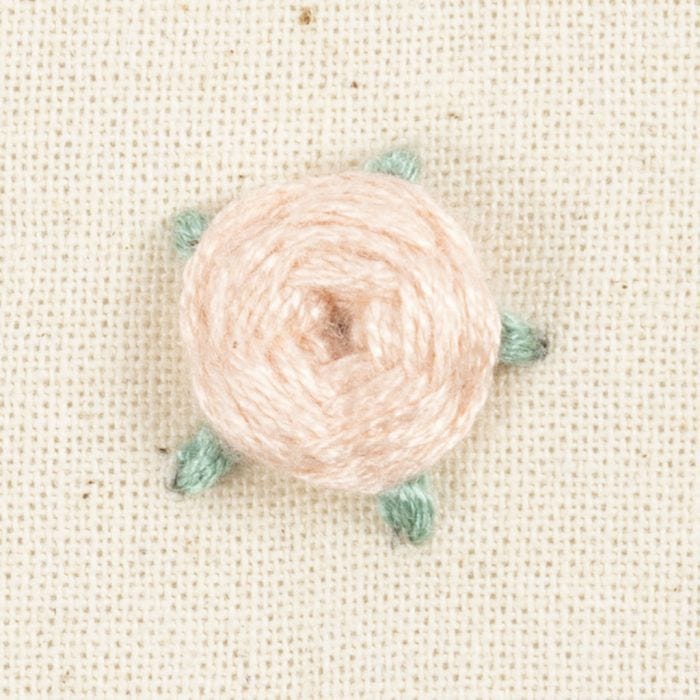 Come ricamare le rose intrecciate
