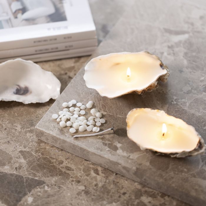 Candele in cera di soia in conchiglie di ostriche