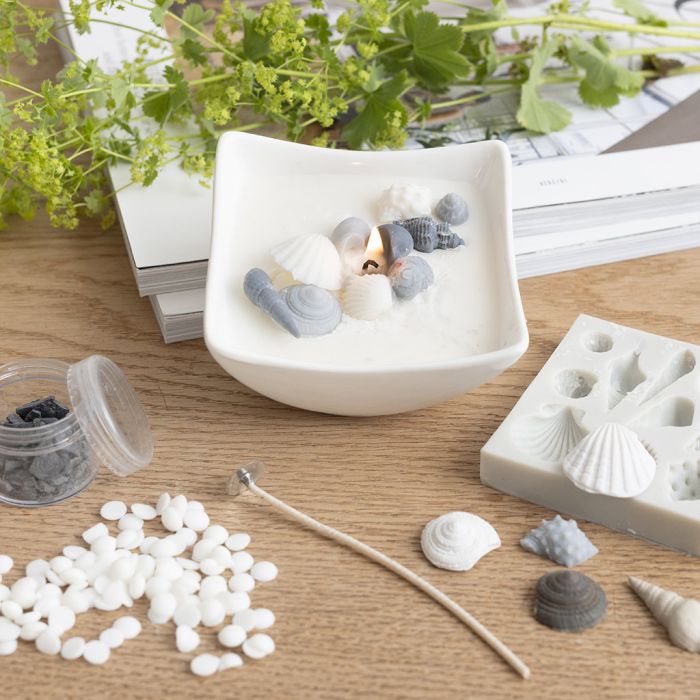 Portacandele con conchiglie da spiaggia