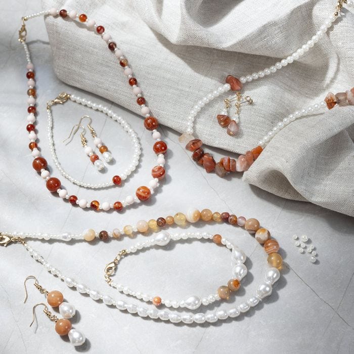 Set di gioielli con agate e perline di cera