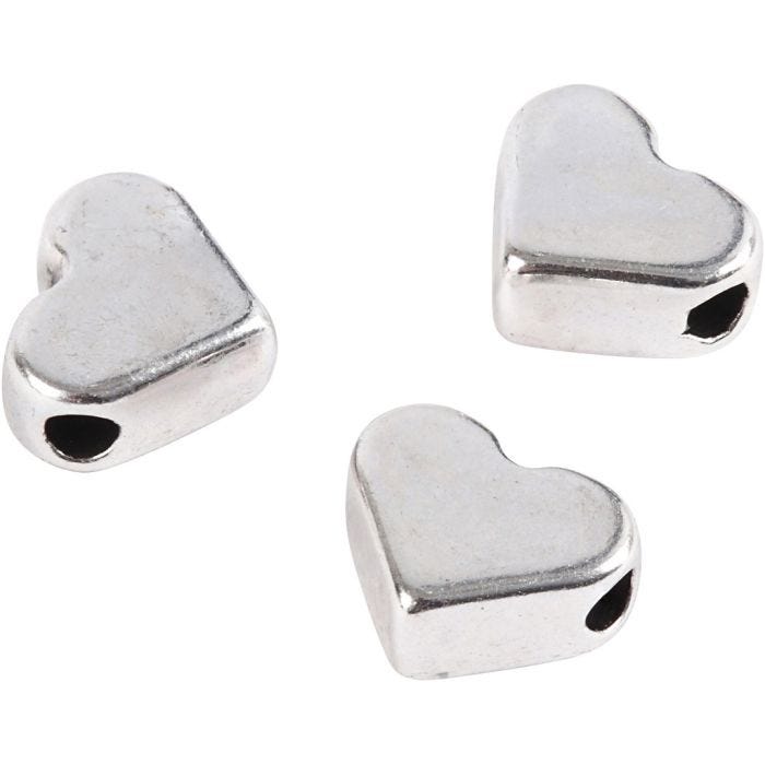 Perla spaziatrice, misura 5,5x7 mm, misura buco 1 mm, placcato argento, 3 pz/ 1 conf.