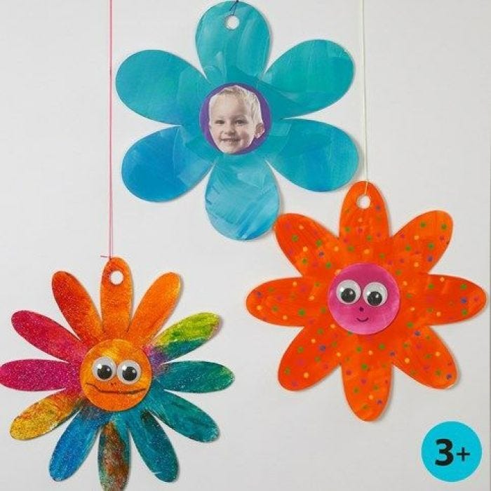 Glitter Paint and Wiggle Eyes on Card Flowers