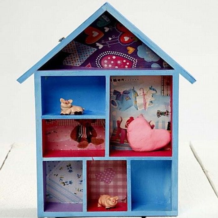 A House Shaped Shelving System with Decoupage