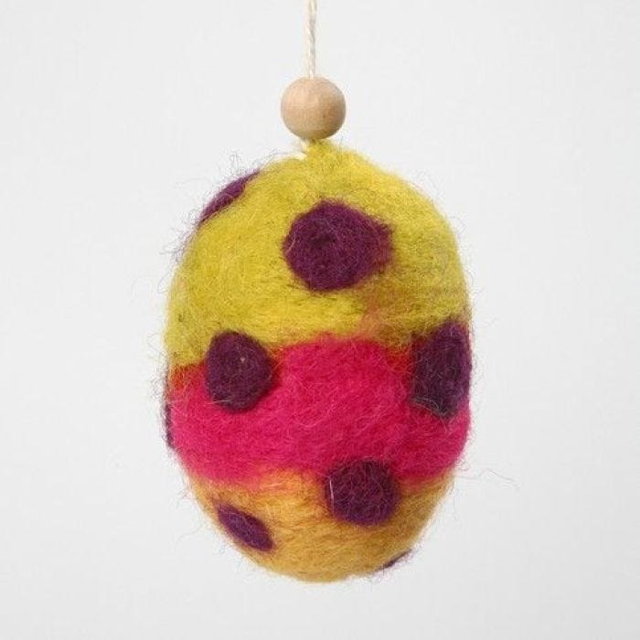 A Polystyrene Egg with Needle Felted Carded Wool