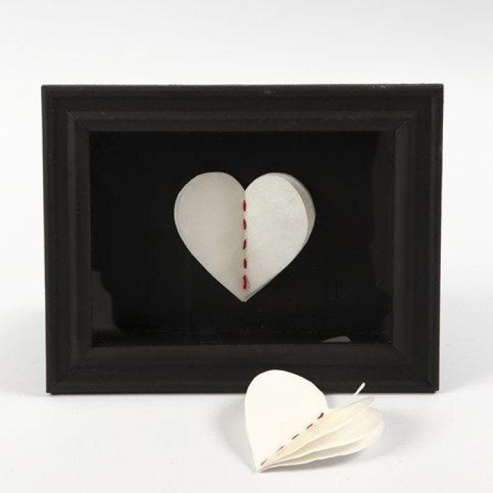 A 3D framed Heart made from Layers of handmade Paper