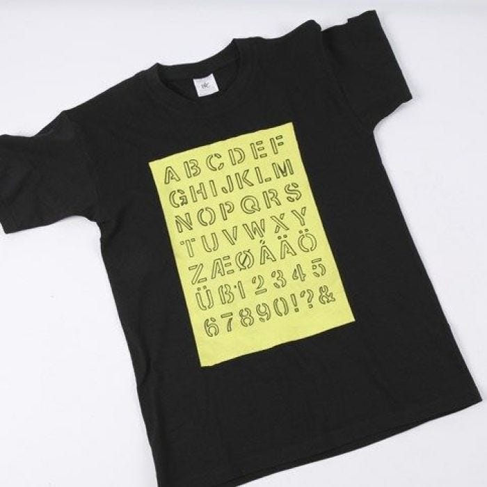 A T-Shirt with the Alphabet drawn onto a painted Area