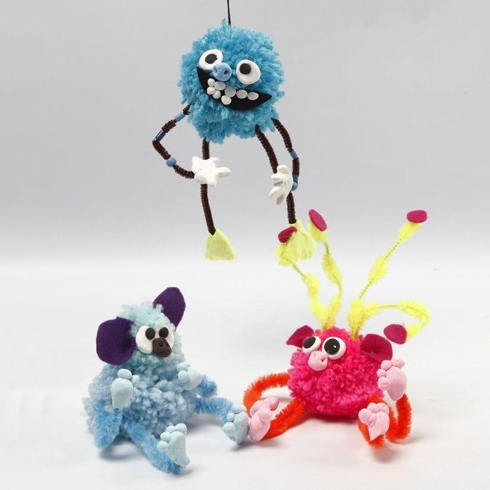 Animali fantastici realizzati con pom-poms, scovolini, perle e Silk Clay