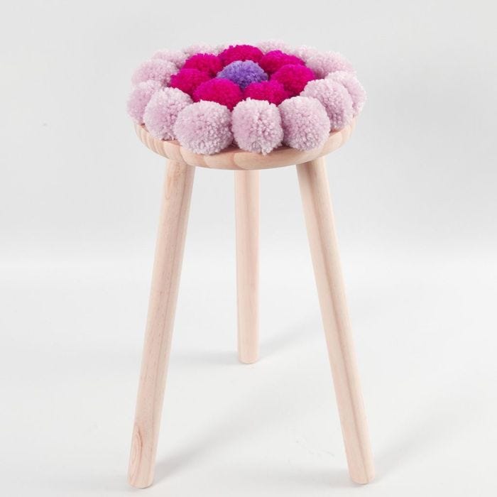 Cuscino da sgabello con pom-poms