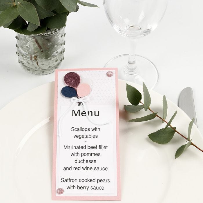 Un menu con palloncini di carta decorati con Deco Foil