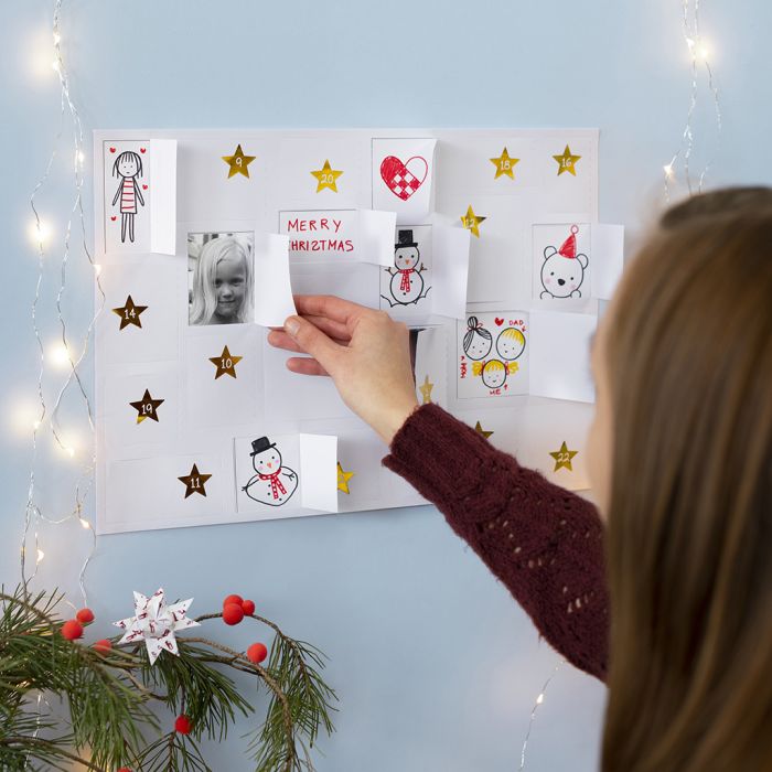 Crea il tuo calendario di Natale con disegni, adesivi e figure
