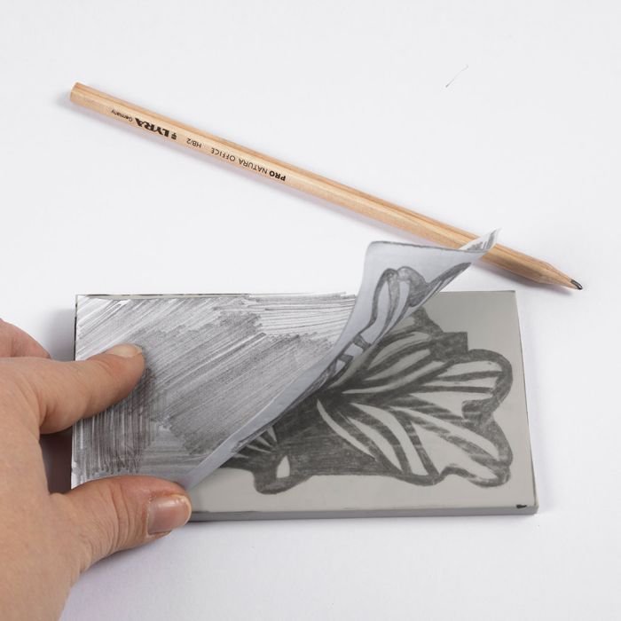 Come trasferire un disegno su una lastra per stampa