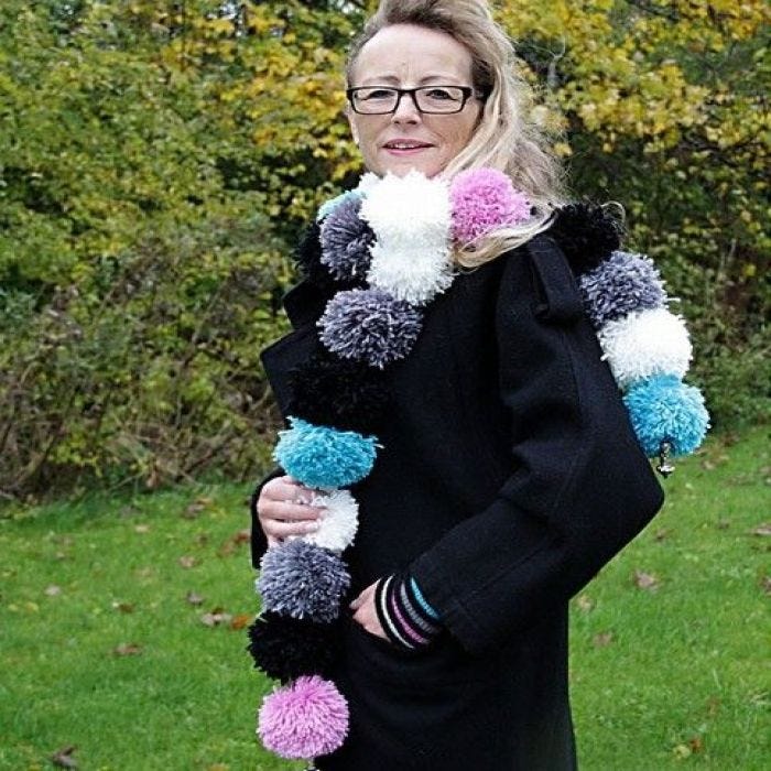 A Pom-Pom Scarf and Wrist Warmers