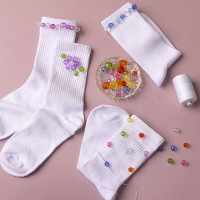Calze decorate con perline