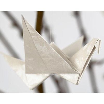 Uccello di carta piegata