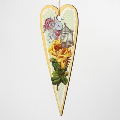 Decorazioni primaverili create con sagome in legno a découpage