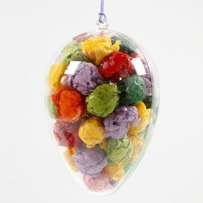 Uovo trasparente pieno di palline di carta velina