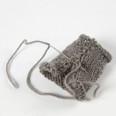 A knitted and felted decorative Bauble