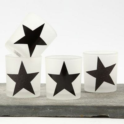 Portacandele con stelle di carta decorata