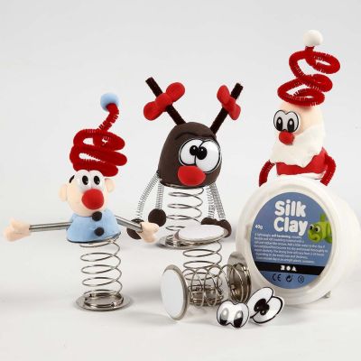 Silk Clay Christmas Figures on a coiled Spring