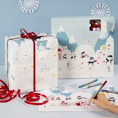 Colorare su un calendario dell'Avvento a scatole e su carta da regalo con disegni Winter Wonderland