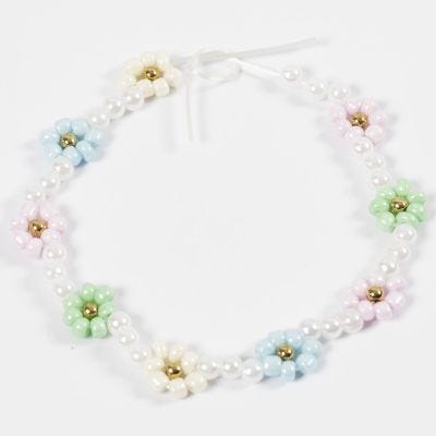 Come realizzare piccoli fiori di perline rocaille su un filo elastico