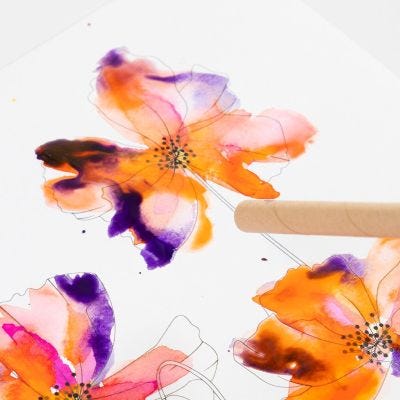 Come creare effetti in acquerello con un tubo di soffiatura
