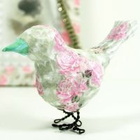 A decoupaged Paper Bird on Feet made from Floral Wire