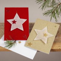 Biglietti natalizi glitter con stelle da appendere in carta pergamena