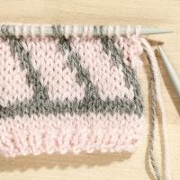 Come fare un'isola fatata a maglia con due colori