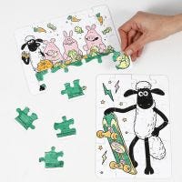 Un puzzle di Shawn the Sheep decorato con pennarelli
