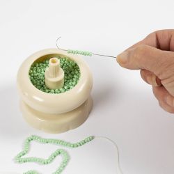 Scatola per erogazione di perline